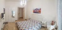 A bed or beds in a room at CiaoRoma!