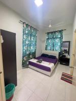 NaiS Homestayにあるベッド