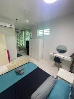NaiS Homestayにあるベッド