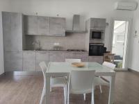 A kitchen or kitchenette at Villa Punta Piccola sul mare