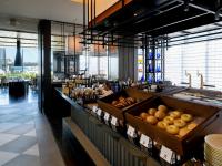 a restaurant with a counter with lots of food at ReLabo -Medical Spa & Stay- in Aomori