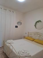 Łóżko lub łóżka w pokoju w obiekcie Villa mara
