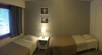 Postel nebo postele na pokoji v ubytování Guesthouse Borealis Apartments