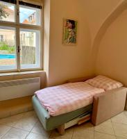 Postel nebo postele na pokoji v ubytování Apartmán Dominikánská