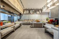 a large kitchen with a lot of food at Grand Madison Longhua Yujing Shenzhen in Lung Wa