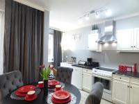 Kuchyňa alebo kuchynka v ubytovaní Apartamenty Albatros ARK