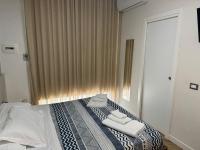 Rooms Garibaldiにあるベッド