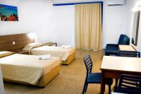 Postel nebo postele na pokoji v ubytování Green Bungalows Hotel Apartments