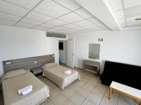Postel nebo postele na pokoji v ubytování Green Bungalows Hotel Apartments