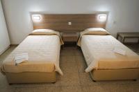 Postel nebo postele na pokoji v ubytování Green Bungalows Hotel Apartments