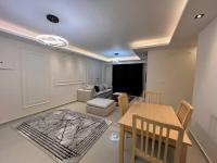 Posezení v ubytování Royal Madinaty 2BR Residence