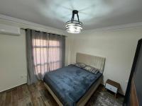 Postel nebo postele na pokoji v ubytování Royal Madinaty 2BR Residence