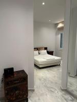 Posteľ alebo postele v izbe v ubytovaní Palace Apartment