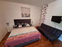 Posteľ alebo postele v izbe v ubytovaní Apartments Kapelica