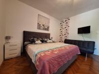 Posteľ alebo postele v izbe v ubytovaní Apartments Kapelica