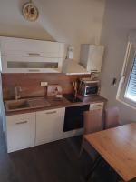 Kuchyňa alebo kuchynka v ubytovaní Apartments Hasanovic Rukavac