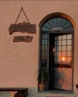 a entrance to a restaurant with a sign above a door at Agriturismo Il Sorbo Appartamento Menta in Sticciano