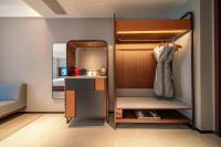 UrCove By HYATT Chengdu Wenshu Monasteryにあるベッド