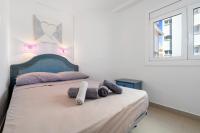 Postel nebo postele na pokoji v ubytování Hauzify I Apartament Cannes