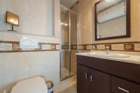 Koupelna v ubytování Hauzify I Apartament Cannes
