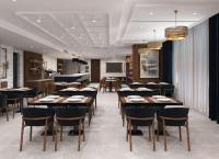 een restaurant met tafels en stoelen in een kamer bij Doubletree By Hilton Suites Trabzon Yomra in Trabzon