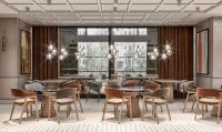 een restaurant met tafels en stoelen en grote ramen bij Doubletree By Hilton Suites Trabzon Yomra in Trabzon