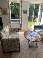 Posedenie v ubytovaní Bonheur en Seine, Piscine, Vue Seine