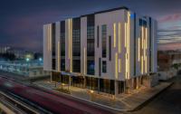 a rendering of a building on a highway at night at Sunway Tabuk Hotel in Tabuk