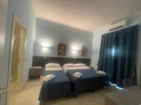 Posteľ alebo postele v izbe v ubytovaní Residence Lodi