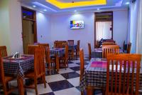 TV in/ali zabaviščno središče v nastanitvi Aves Executive Hotel