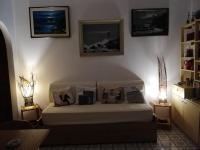 Postel nebo postele na pokoji v ubytování La casa del Capitano, l'uomo e il mare ...