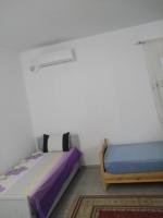 Postel nebo postele na pokoji v ubytování Tezdaine villa
