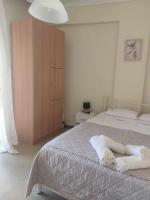 Posteľ alebo postele v izbe v ubytovaní Luminosa Seaview Apartment