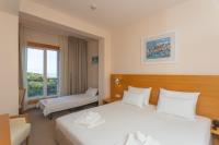 Posteľ alebo postele v izbe v ubytovaní Family Hotel La Luna - All inclusive