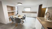 Kuchyň nebo kuchyňský kout v ubytování Sky apartment