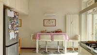 A kitchen or kitchenette at Stanza nr 4 in appartamento incantevole in zona Solari