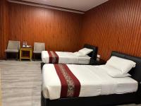 SS Hotel Serembanにあるベッド