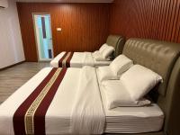 SS Hotel Serembanにあるベッド