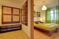 Łóżko lub łóżka w pokoju w obiekcie Klimatyczne Apartamenty Sun Seasons 24 w Szklarskiej Porębie by Noclegi Renters