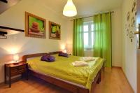 Łóżko lub łóżka w pokoju w obiekcie Klimatyczne Apartamenty Sun Seasons 24 w Szklarskiej Porębie by Noclegi Renters