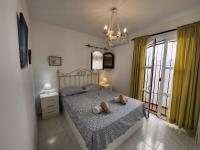 A bed or beds in a room at Los Almendros
