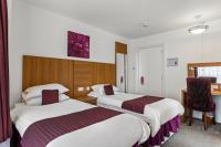 Postel nebo postele na pokoji v ubytování Magnuson Hotel Sandy Lodge Newquay