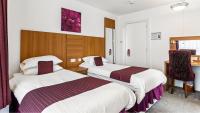 Postel nebo postele na pokoji v ubytování Magnuson Hotel Sandy Lodge Newquay