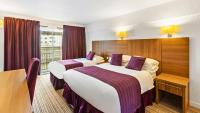 Postel nebo postele na pokoji v ubytování Magnuson Hotel Sandy Lodge Newquay
