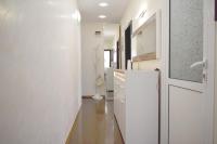 Kuchyň nebo kuchyňský kout v ubytování Apartment with 2 Bedrooms and Parking Near the Beach