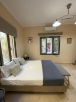 Posteľ alebo postele v izbe v ubytovaní Casa Mersini