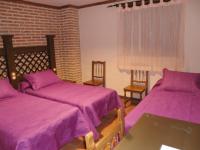 Posteľ alebo postele v izbe v ubytovaní Hotel Rural El Rocal