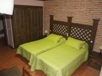 Posteľ alebo postele v izbe v ubytovaní Hotel Rural El Rocal