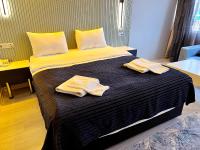 A bed or beds in a room at Comfort Downtown Istanbul