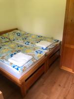 Postel nebo postele na pokoji v ubytování Lovecká chata Myslivna